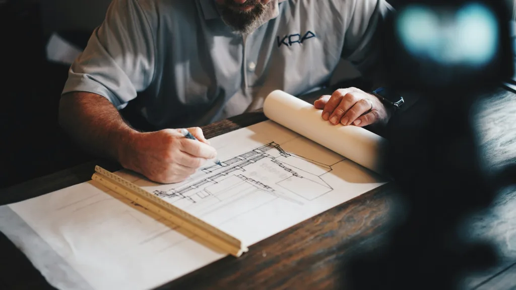 Engineer reviewing drawings on site